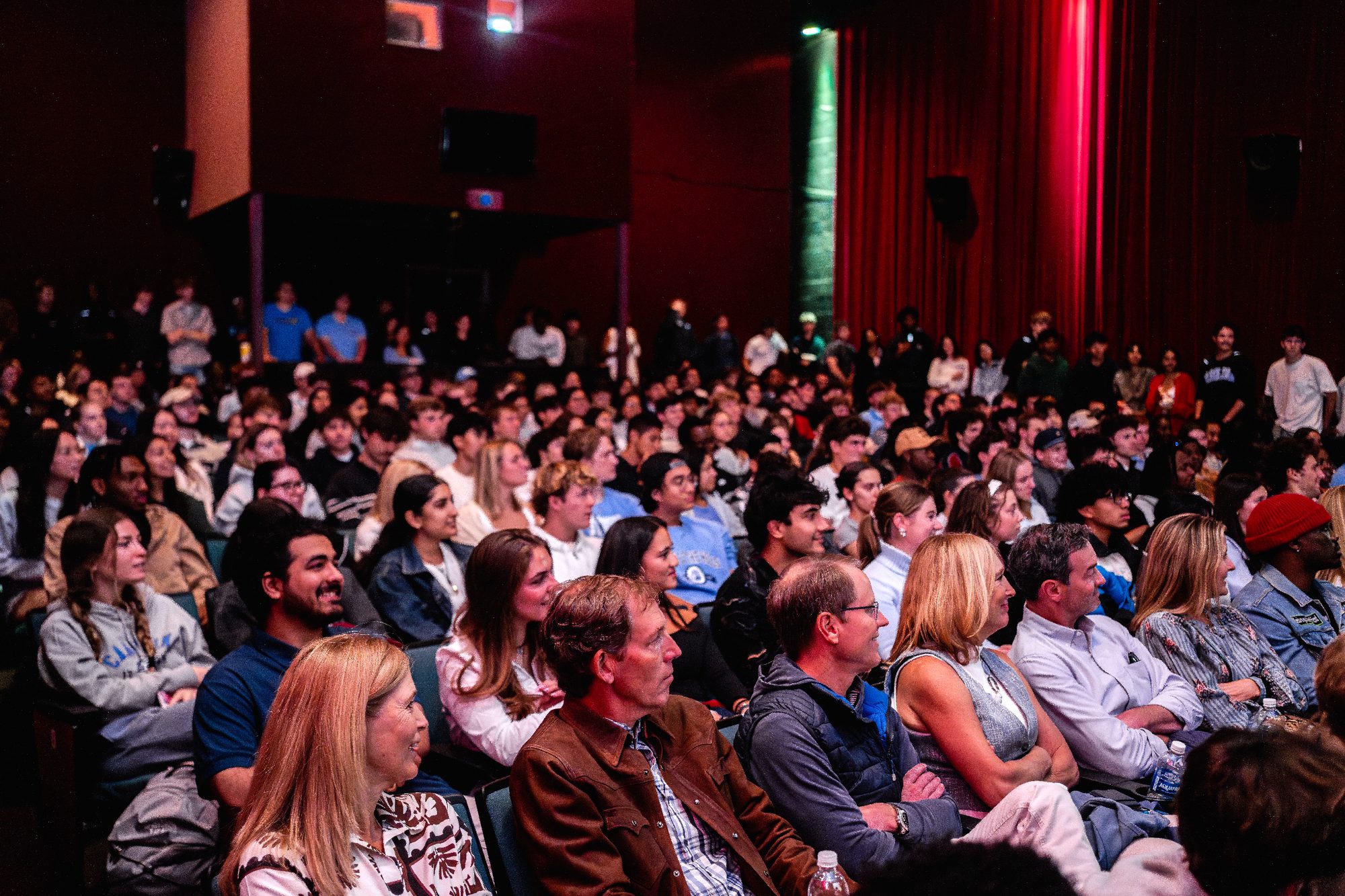 A packed auditorium audience listening to a Bell Leadership Series talk